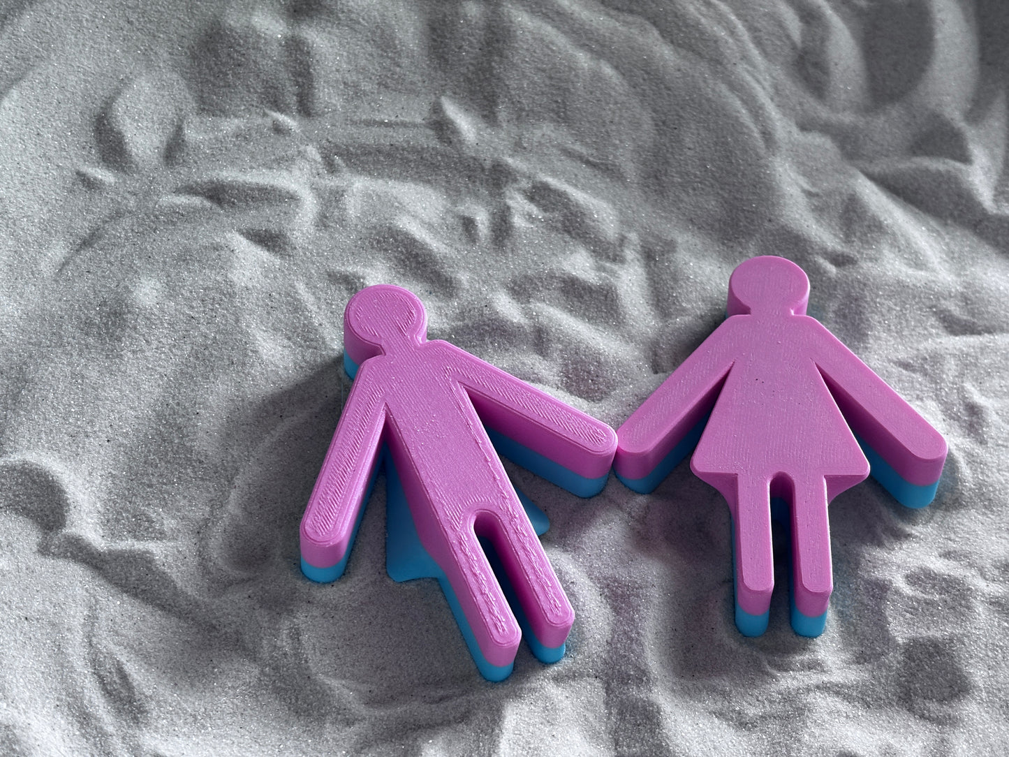 Flippable masculine and feminine figurine